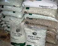 bags of lawn fertilizer